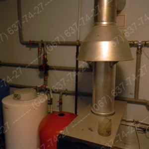 Установка твердотопливного котла  Сокол